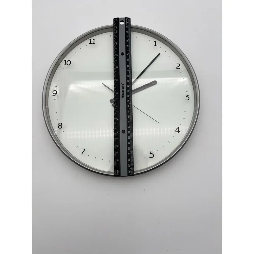 Bulova Quartz White Wall Clock 12”x 12”. Tested Works. Very Good Condition.